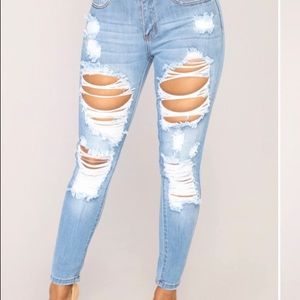 Denim fashion nova ripped “Give good love” jeans
